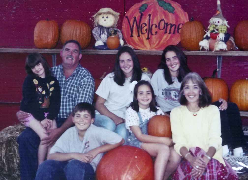 Family with pumpkins