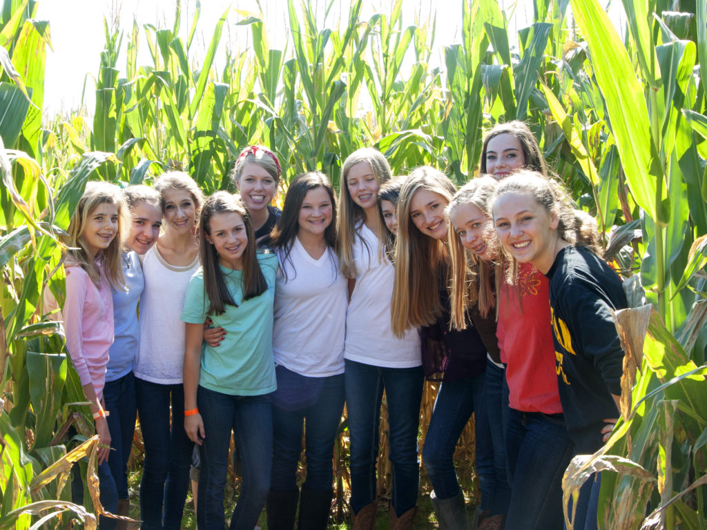 Group of kids in corn field